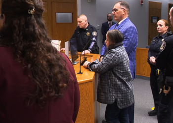 2ª hija acusada en relación a la muerte del padre en Woonsocket